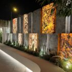 Realizacja elewacji oraz ogrodzenia fornirem kamiennym transparentnym spring stone do podświetlenia